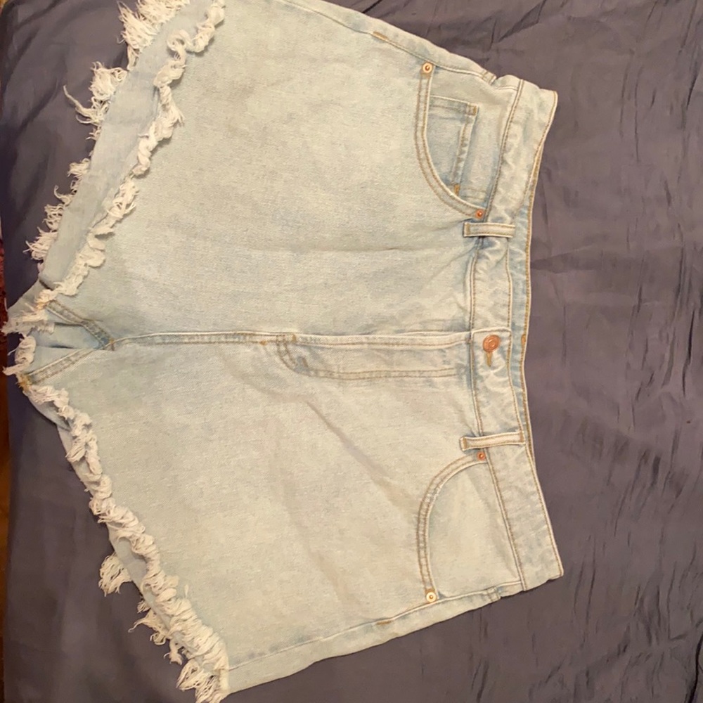 High waste button light wash shorts
